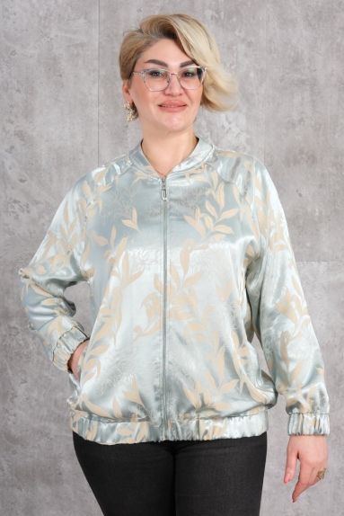  This Plus Size Womens Short Sports Jacket comes in a stylish green color with a comfortable design. The jacket worn by the model is made of 80% polyester and 20% cotton fabric. The available sizes for this product are 42, 44, 46, and 48. This jacket offers both comfort and style during sports activities or daily wear. It features a zipper detail on the front and elastic bands at the cuffs and hem. The jacket has elegant patterns on both the front and back.